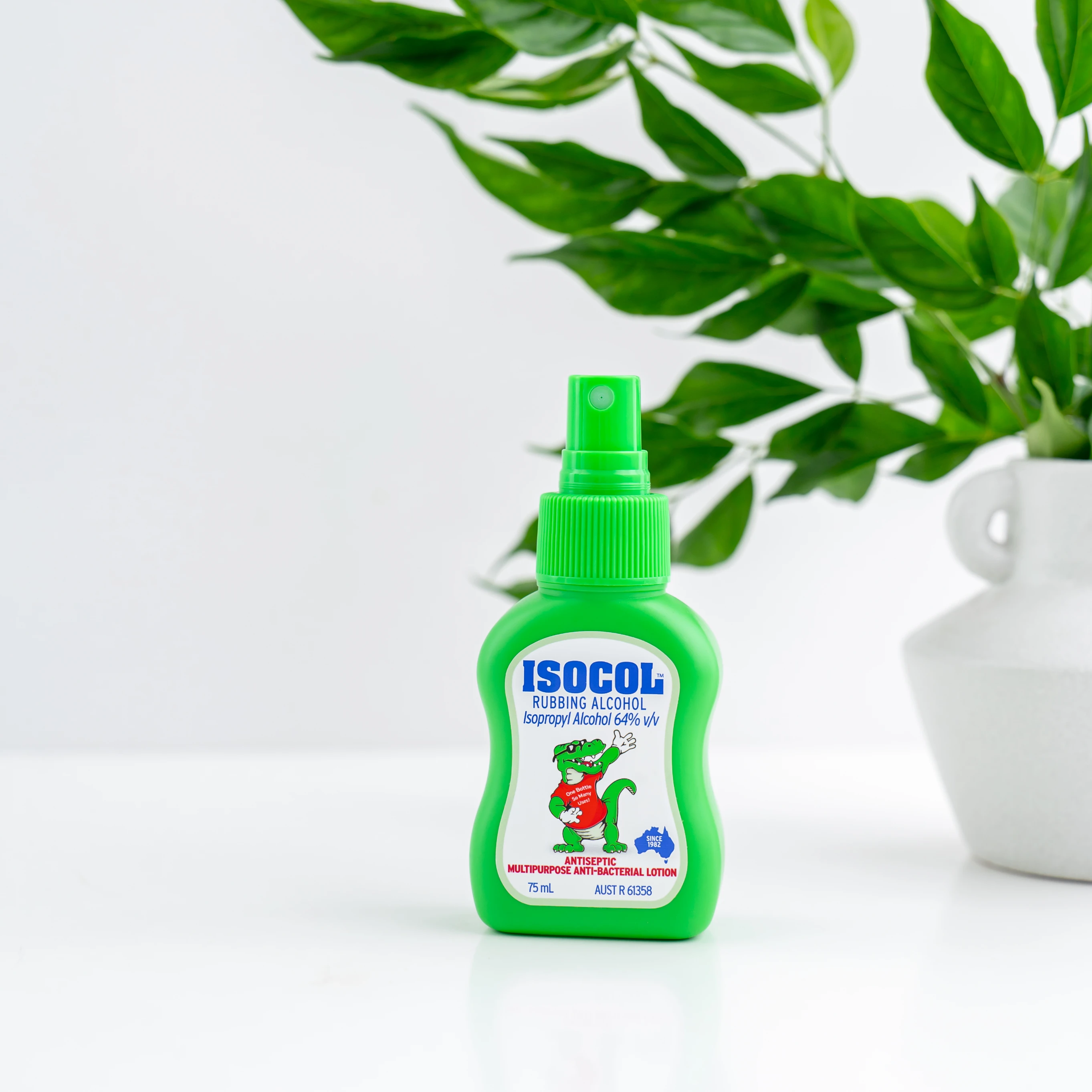 ISOCOL Rubbing Alcohol Antiseptic Spray 75ml - Side view of travel size bottle
